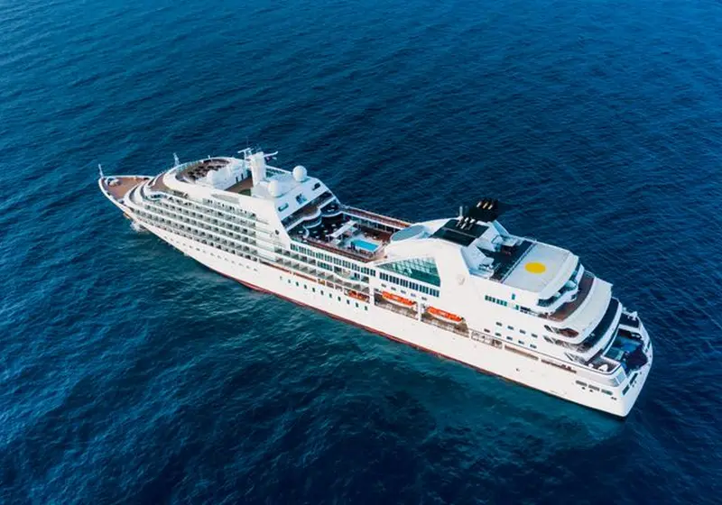 Cruise ship sailing on deep blue ocean